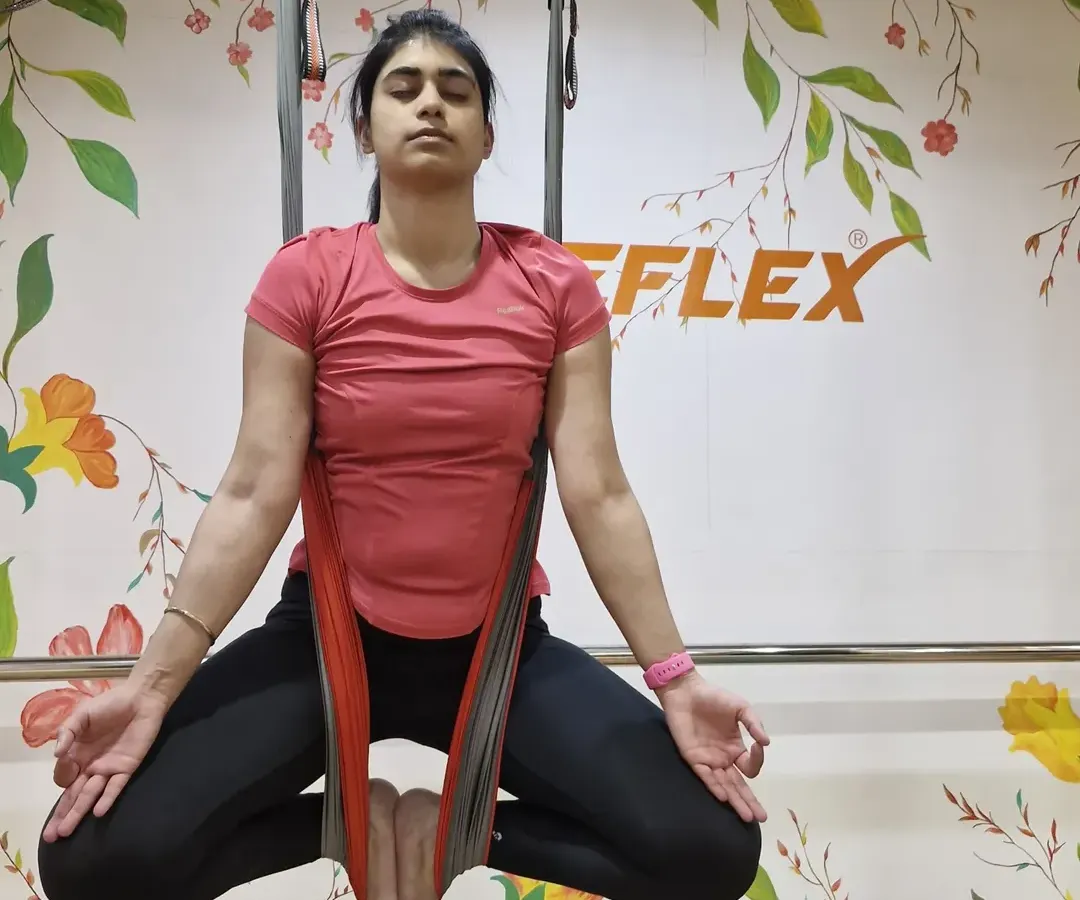 Find your calm mid-air. This floating Baddha Konasana, or butterfly pose, is one of our favorite ways to end a session. It allows for a deep hip-opening stretch and a moment of pure, weightless meditation, letting all the stress just melt away.