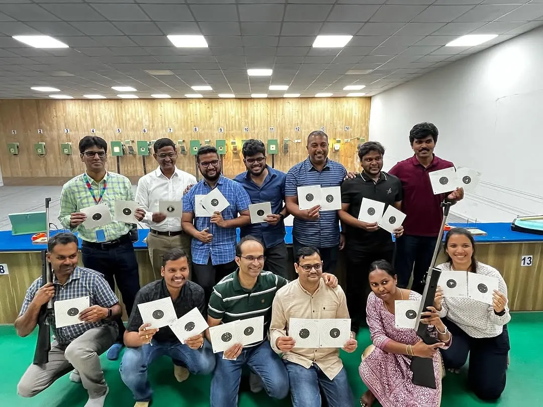 Looking for a unique corporate team building activity? We host groups from various companies for a session of focus, friendly competition, and fun. Here's a team proudly showing their targets after their first shooting experience.