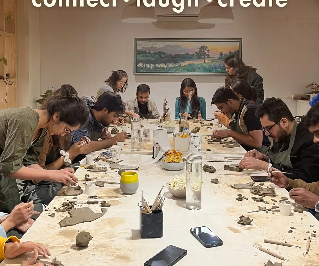 Connect, laugh, and create. Our studio is more than just a place to make art; it's a space to bond with your team, friends, or family. Here, a group gets hands-on with a clay handbuilding activity, perfect for a team outing.