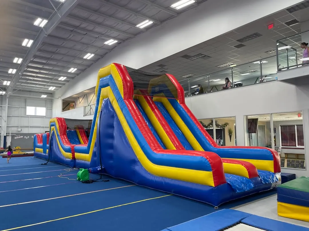 Our gym transforms into an adventure zone with HUGE inflatables. These obstacle courses are a favorite during camps and our popular Friday Fun Nights.