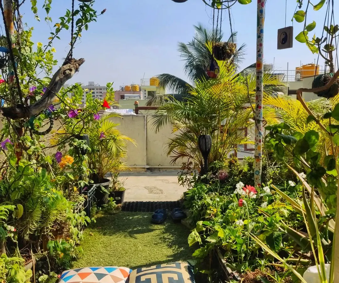 A garden is a space to be lived in. I design cozy seating nooks like this one, perfect for your morning tea or simply sitting quietly among the plants on a sunny Bangalore afternoon.