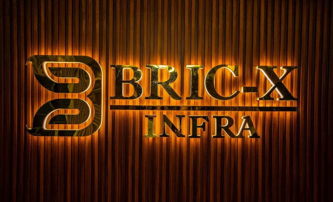 For my corporate clients, branding is everything. I create sharp, impactful photos like this backlit logo for Bric-X Infra, perfect for their website, marketing materials, and office decor.