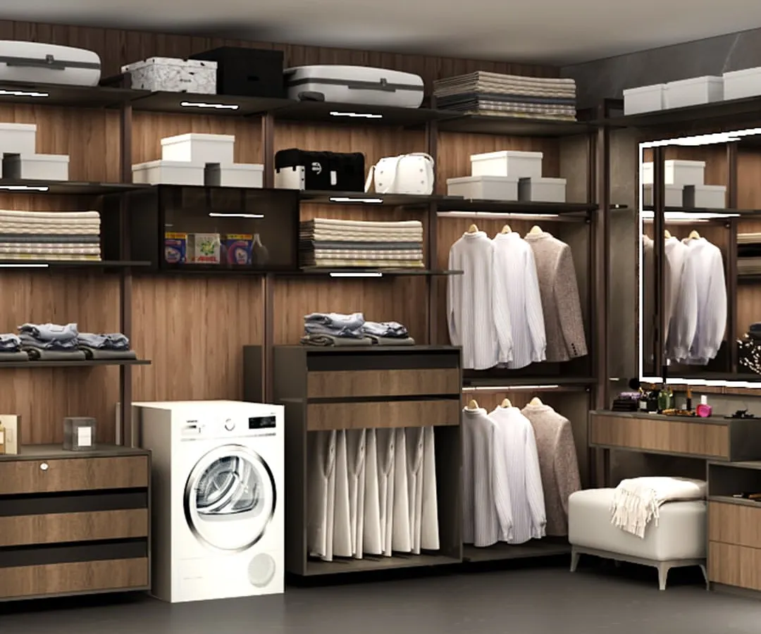 We designed this comprehensive walk-in closet to be a complete garment care station. It features dedicated sections for hanging clothes, folded items, accessories, and even integrates a washing machine, proving that functionality and luxury can coexist beautifully.