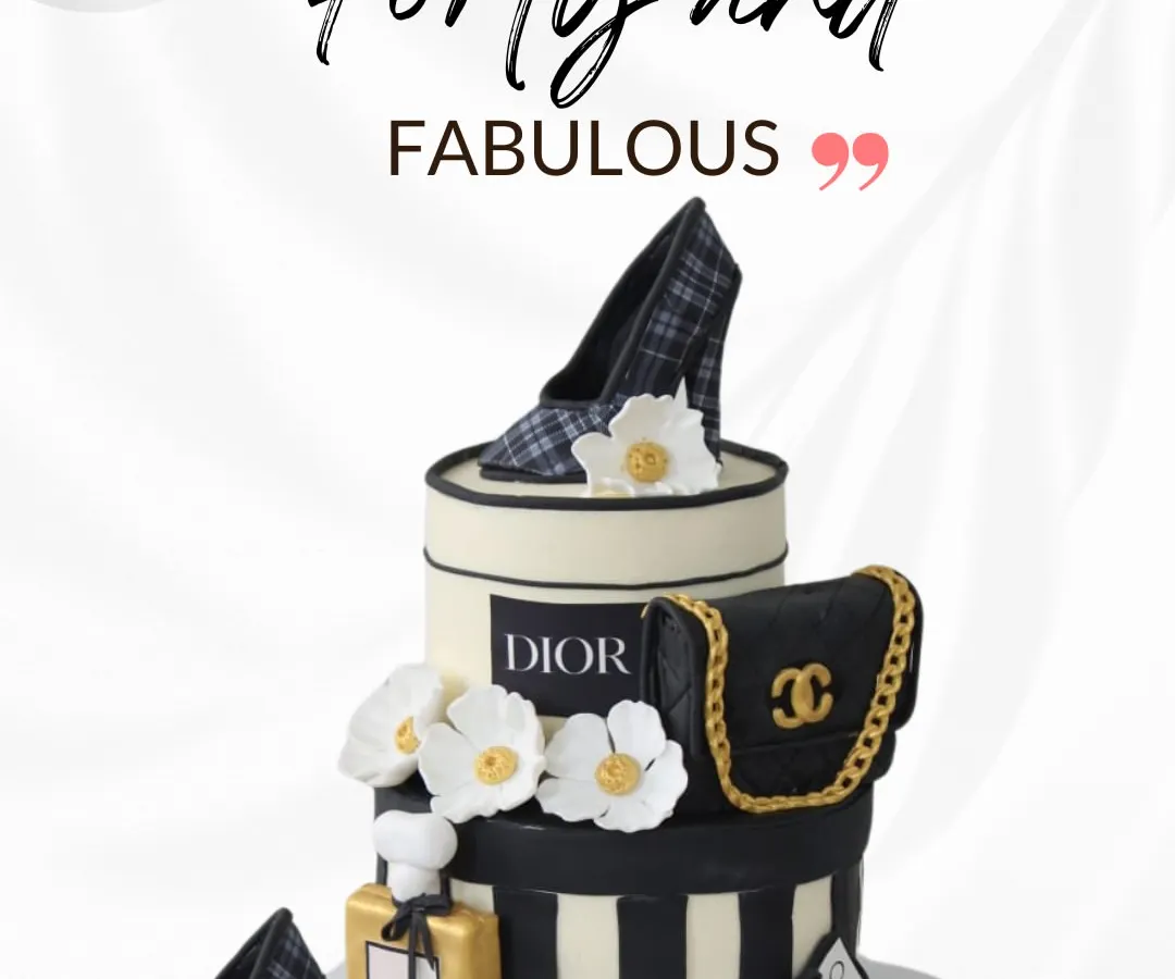 For the fashion-forward individual, this "Forty and Fabulous" cake is the ultimate statement piece. It's a two-tiered design inspired by luxury brands like Dior, complete with edible, handcrafted fondant details like a designer bag, perfume bottle, and stylish shoes.