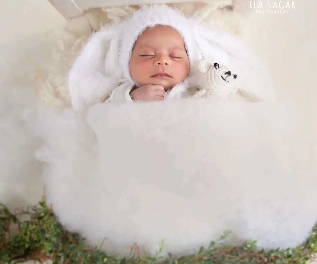 You can create such peaceful portraits with these props. This setup features one of my miniature wooden beds, a soft fluffy blanket, and a handmade fuzzy bunny bonnet, all of which are available.