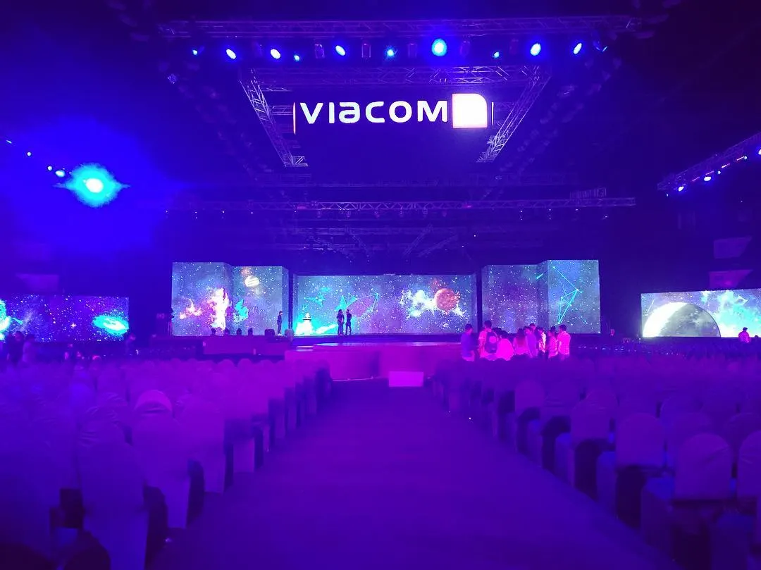 For Viacom's 10th-anniversary event, I designed this massive stage setup inside the NSCI Dome. The highlight was a 180-degree wrap-around LED screen that created a fully immersive visual experience for over 3500 attendees, showcasing my capability for large-scale corporate event production.