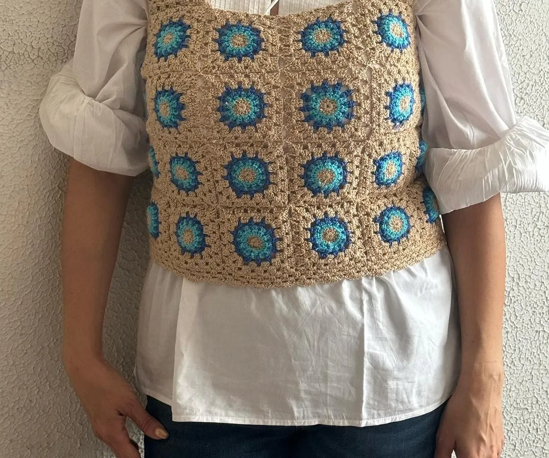 Here’s how one of my clients styled my granny square vest. I love seeing how you make my pieces your own. This vest is versatile enough to layer over a shirt for a chic look or wear by itself.