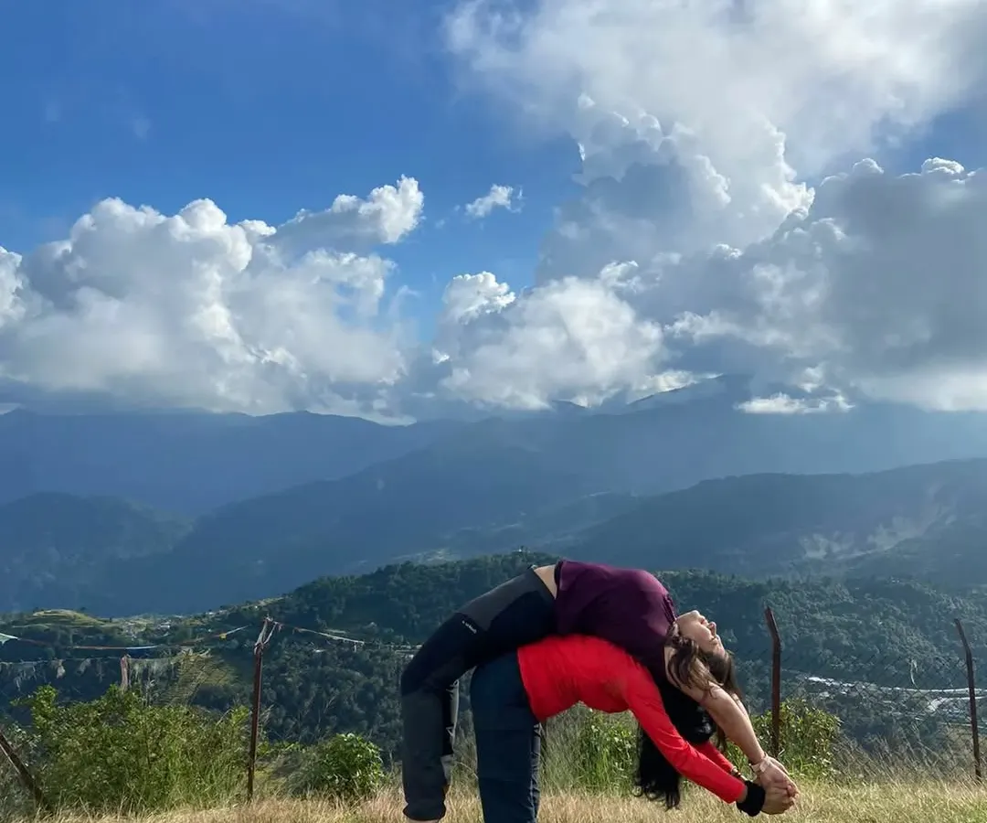 Yoga is often a personal journey, but it is powerful when shared. On my retreats, we support each other, practice together, and build a community against the backdrop of the world's most stunning landscapes, like these mountains in Nepal.