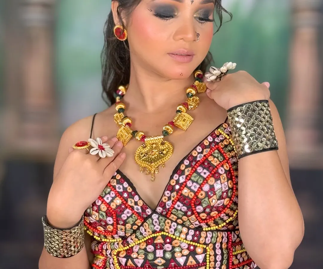 A close-up of my signature Navratri glam. The focus is on a dramatic smokey eye, sharp contouring, and a bold lip, ensuring the makeup is powerful enough to stand out during festive nights.
