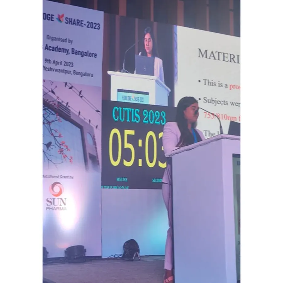 Here I am presenting my research at the KNOWLEDGE SHARE 2023 conference. I believe that staying engaged with the latest academic findings in dermatology and trichology is essential for providing the best possible care to my patients.