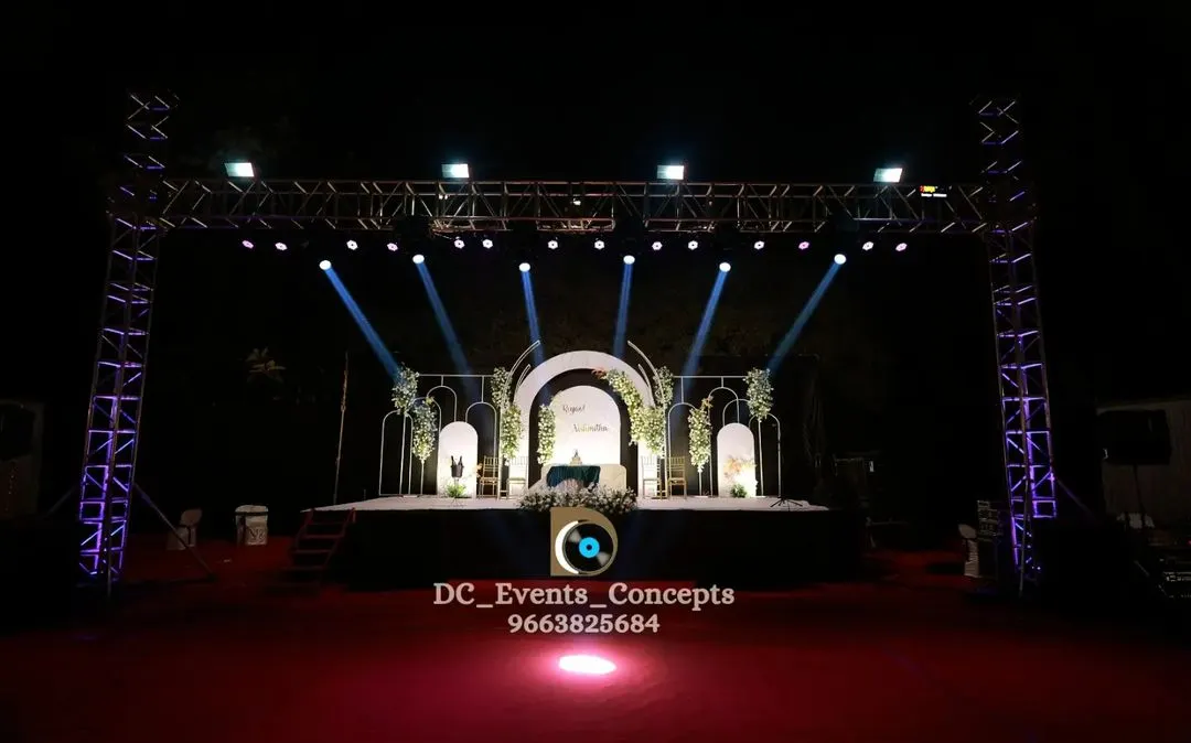 For large-scale receptions and Sangeets, we provide full stage production including robust metal trusses, moving beam lights, and spot lighting to create a concert-like experience.