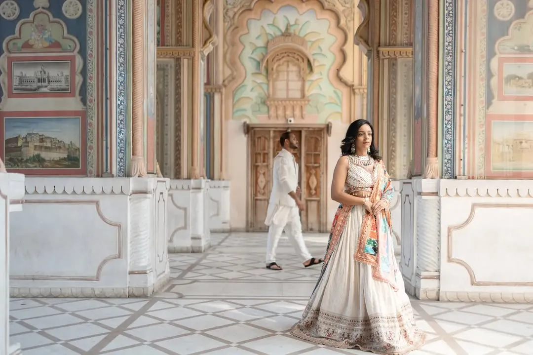 For the couple that dreams of fairytales. Here, against the stunning, hand-painted architecture of Jaipur, we created a moment of regal elegance. This shot shows how I blend your story with the grandeur of a destination, creating timeless, royal pre-wedding portraits.