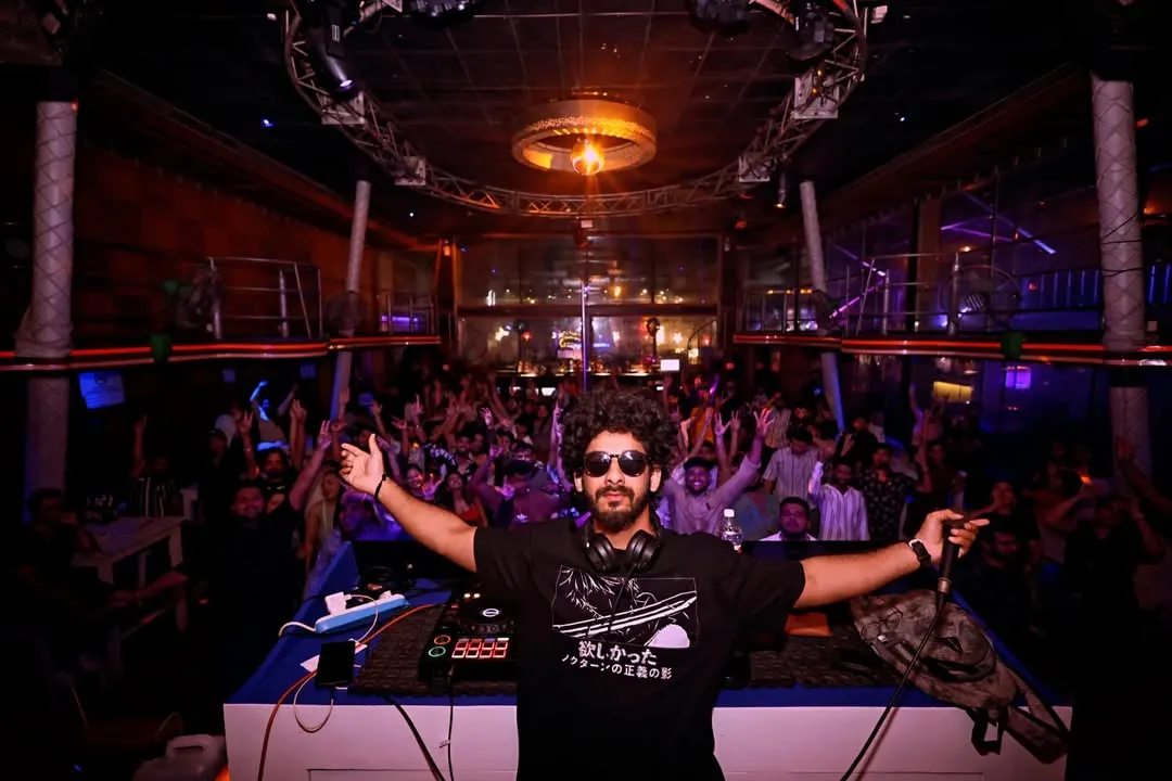 Commanding the stage at Cafe Mambo. My goal is to create a unified experience where the music and the crowd become one. This is the result of tracks built and tested for a packed house.