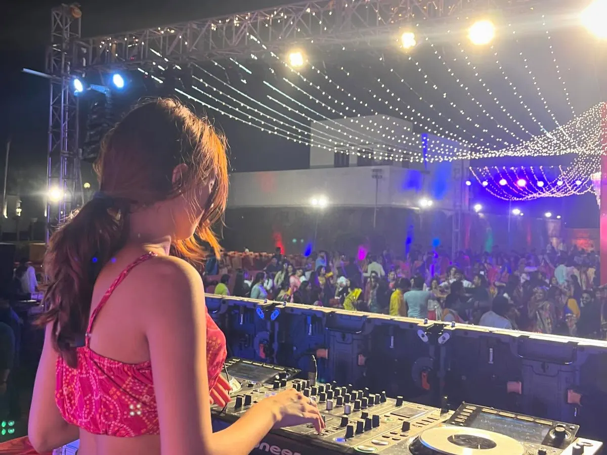 Bringing the energy to a massive Dandiya night under the stars. I love mixing traditional festive tracks with modern beats to create a unique sound that keeps everyone dancing with their dandiya sticks all night long.