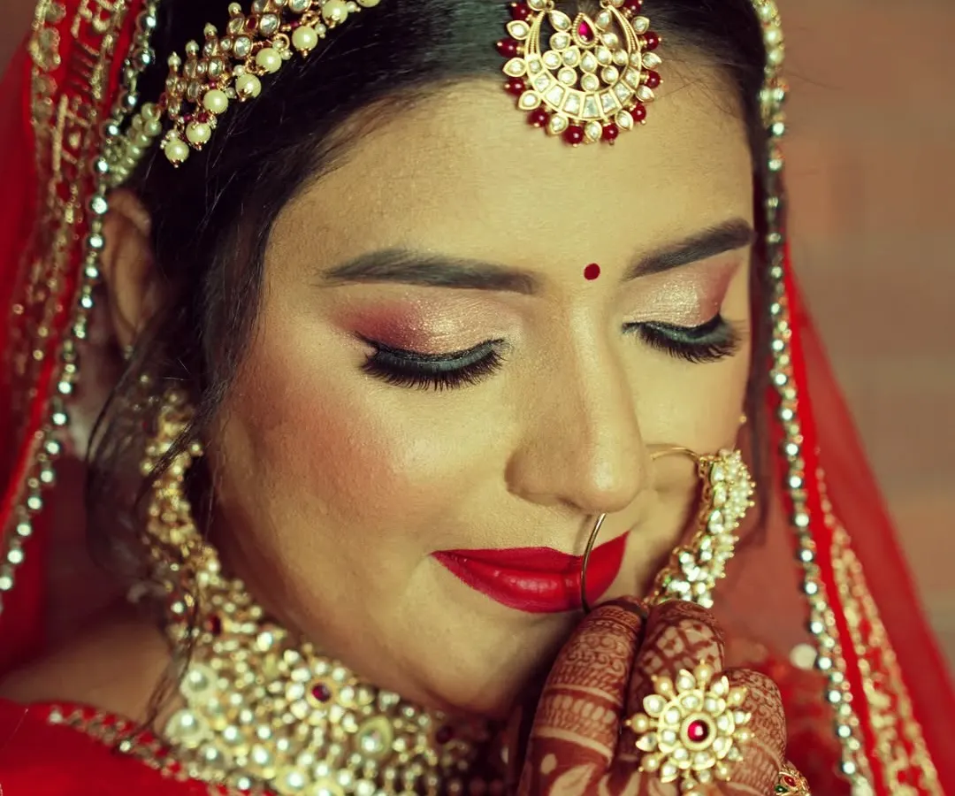 A quiet moment of bridal beauty. For this getting ready shoot, I focused on the intricate details of the makeup and jewelry, capturing the bride's serene expression just before the wedding ceremony.