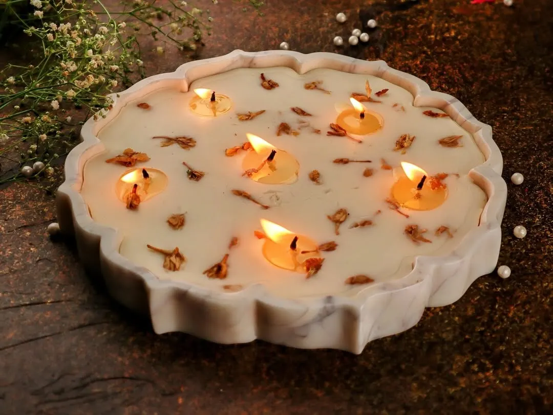 This is my 9-inch Lotus Marble Urli Candle, a true centerpiece designed to transform your space. I hand-pour natural soy wax into a beautifully carved marble urli, creating a piece of decor that feels both luxurious and timeless. It’s perfect for festive occasions or as an elegant statement piece in your living room.