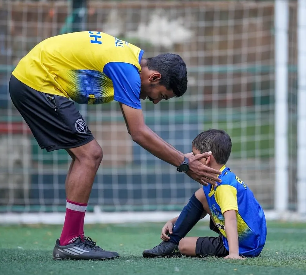 Our coaches are mentors first. We build confidence and character by being there for our players, guiding them through challenges on and off the pitch.