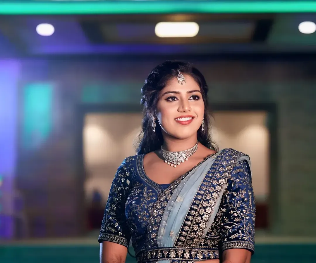 For Sneha's reception, we went for a soft glam look to match her elegant blue lehenga. The focus was on luminous skin and a subtle smokey eye, creating a polished and modern bridal style that lasted all night.