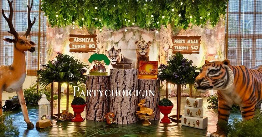 We created an enchanted forest with this 3D jungle theme decoration. The setup includes realistic, life-sized props of a deer and tiger, tree-stump pedestals for the cake, and a ceiling covered in hanging greenery and lights to make guests feel like they've stepped into a different world.