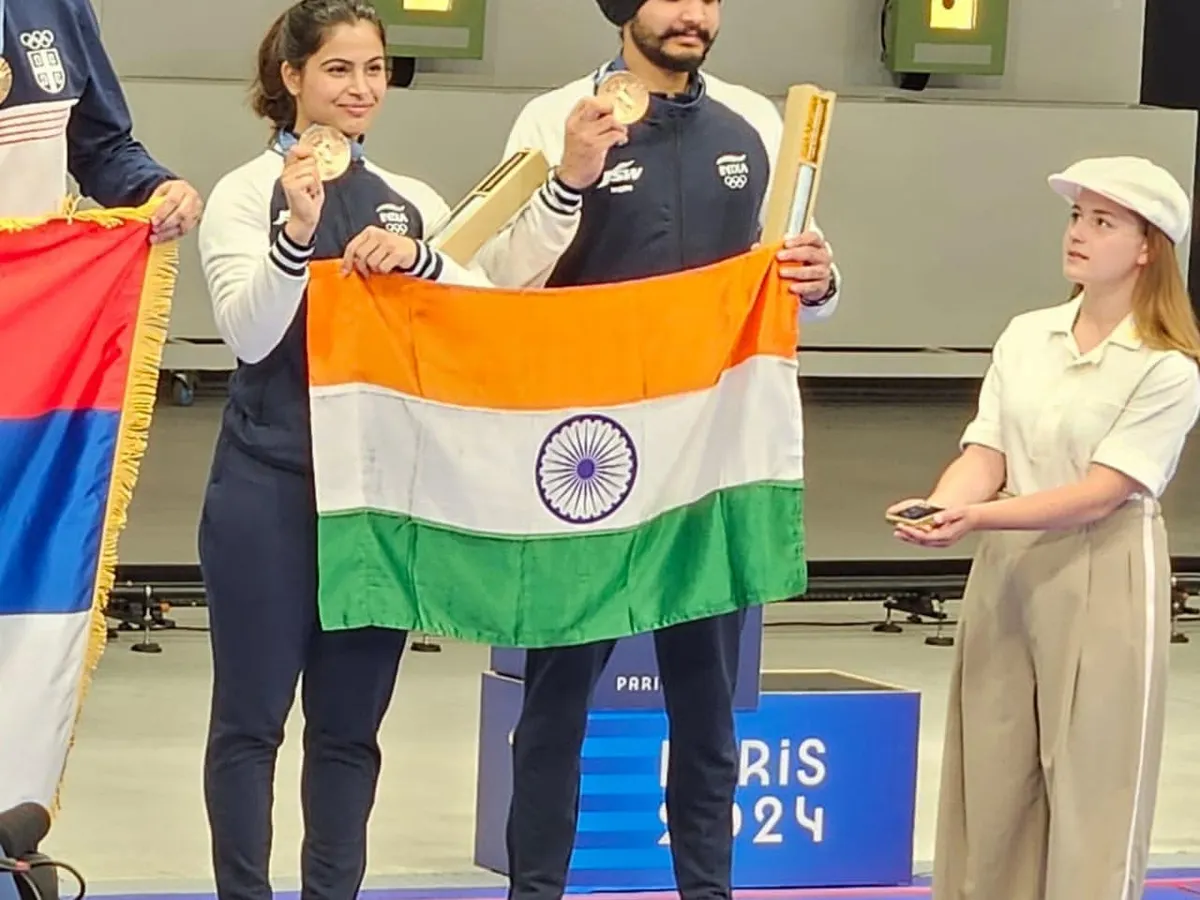A moment of immense national pride. My students Manu Bhaker and Sarabjot Singh on the podium at the Paris 2024 Olympics, holding the Indian flag after winning the bronze medal. This is the result of years of relentless effort and world class preparation.