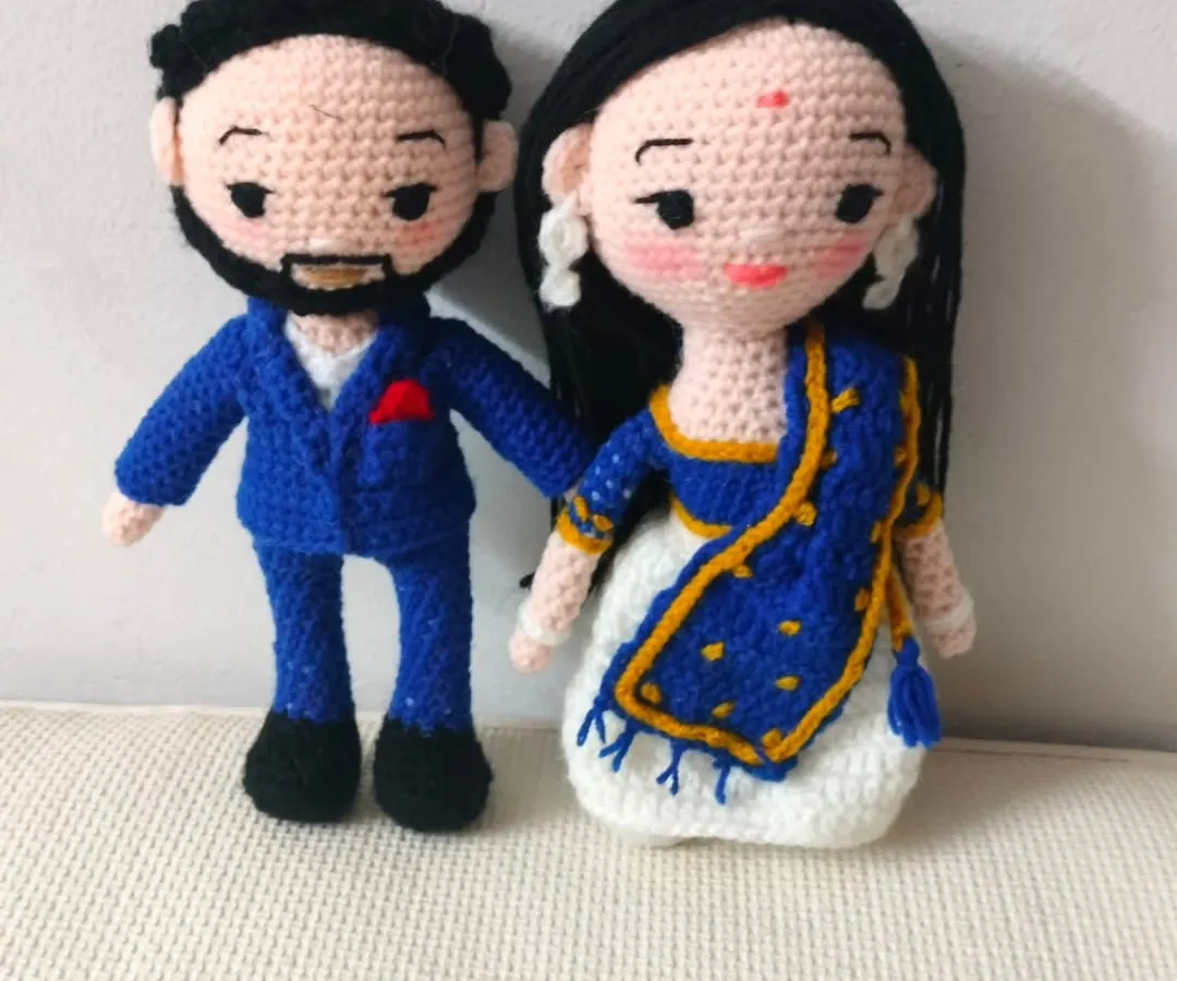 I love making these couple dolls for anniversaries and weddings. This one shows a lovely couple in a beautiful blue and white saree and a matching suit. I can make them in any dress you want, western or Indian.