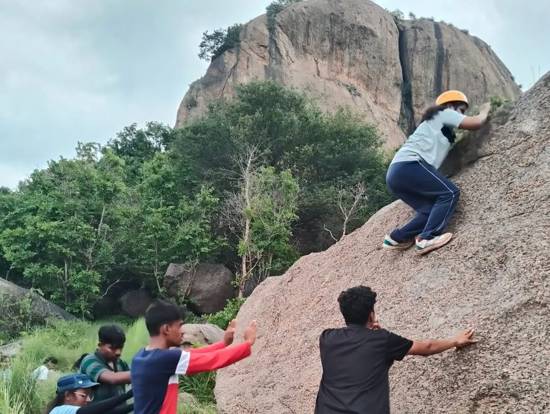At our Ramanagara camp, we introduce young climbers to bouldering with a focus on safety and teamwork. Here, participants learn basic climbing techniques while being supported and spotted by their peers and our instructors.