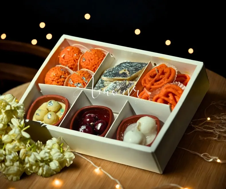 Can you believe these are candles? My Mithai Candle Gift Box is one of my favorite creations. It features hyper-realistic, scented candles that look just like Motichoor Laddoo, Kaju Katli, and Jalebi. It's the perfect way to gift sweetness without the calories.