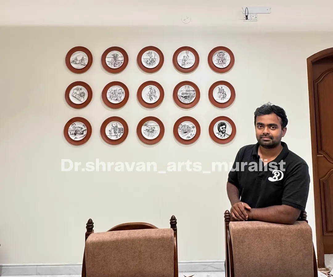 Here I am with a completed custom plate art installation. This project was a blast, telling a story across 15 individual hand-painted plates. It's a truly unique way to personalize a dining space and a great conversation starter for guests.