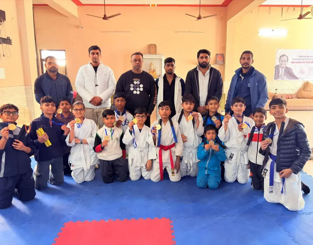 The results of our discipline. This is a group of my students from the Karate Gurukul, each one a winner, proudly displaying the medals they earned through their dedication. I don't just teach karate, I build a team of champions.