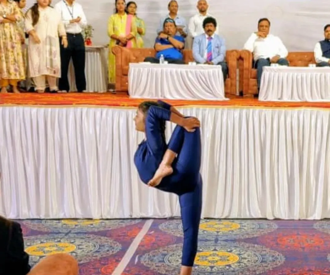 We train our students to achieve incredible levels of flexibility and balance. This is a demonstration of an advanced one-legged balancing posture, showcasing the kind of peak physical control and focus we cultivate in our classes.