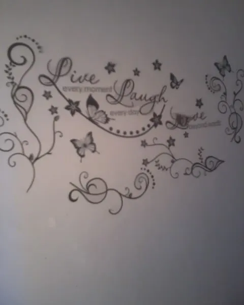 Your favorite words can become part of your home decor. I do custom stencil work like this "Live, Laugh, Love" design, complete with elegant swirls and butterflies, to give your walls a personal and inspiring message.