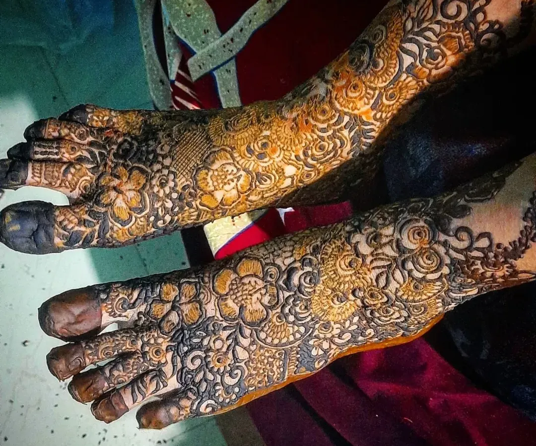Your bridal look isn't complete without mehendi on your feet. Here is an example of my intricate floral and paisley work, showing how the design creates a beautiful pattern from ankle to toe.