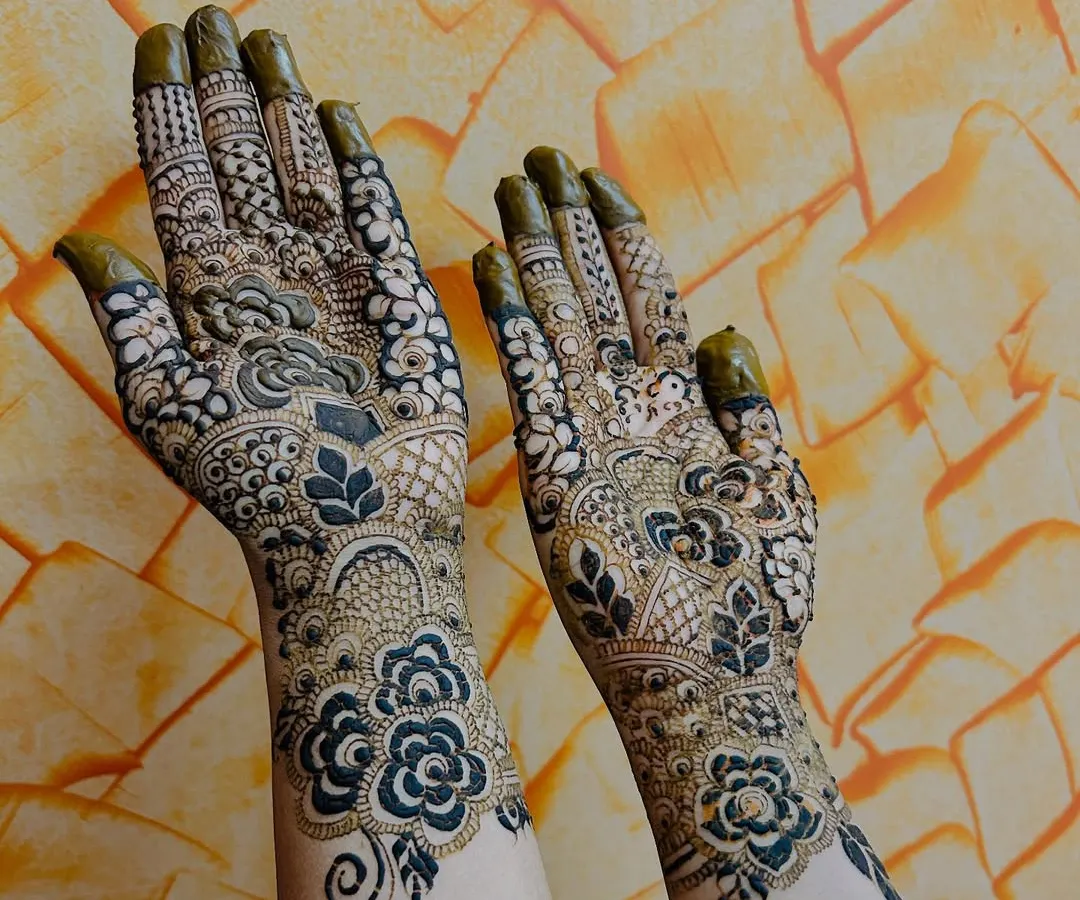 A full bridal henna design, packed with detail. I love creating these dense, traditional patterns that cover the hands and wrists, making sure every part of the design is sharp and meaningful for the bride's big day.