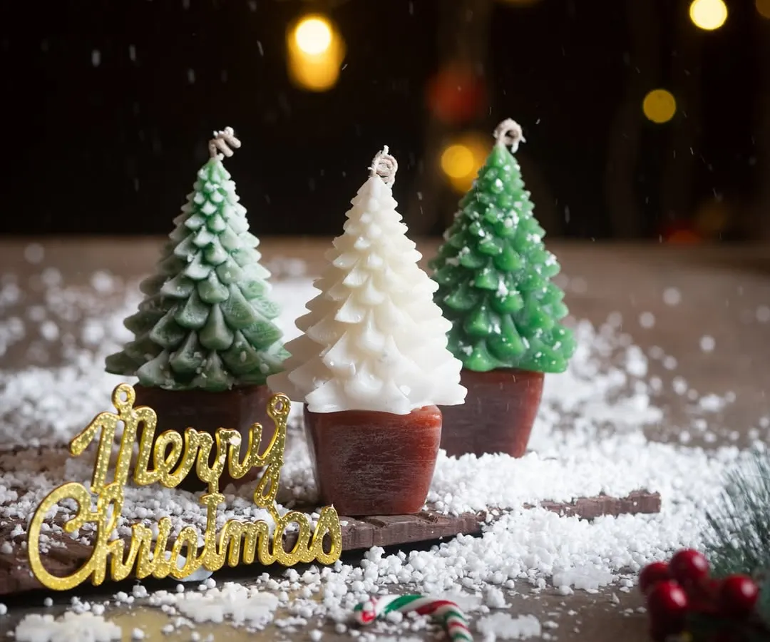 I wanted to capture the magic of a white Christmas with this scene. These are my bestselling Christmas tree candles, set in a snowy landscape with festive candy canes. They are perfect for creating a cozy holiday atmosphere in your home.