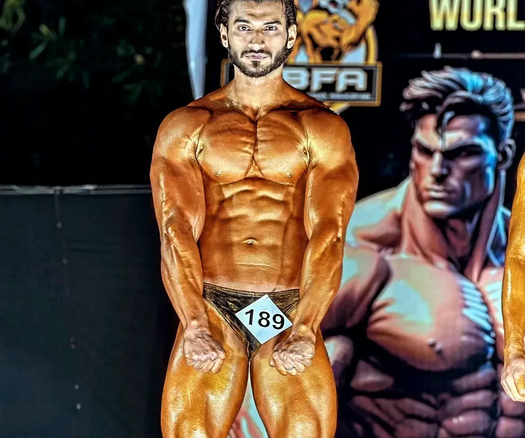 On stage, under the lights, is where hard work is revealed. I build physiques that are not just muscular but also aesthetic and balanced, ready to dominate the competition.
