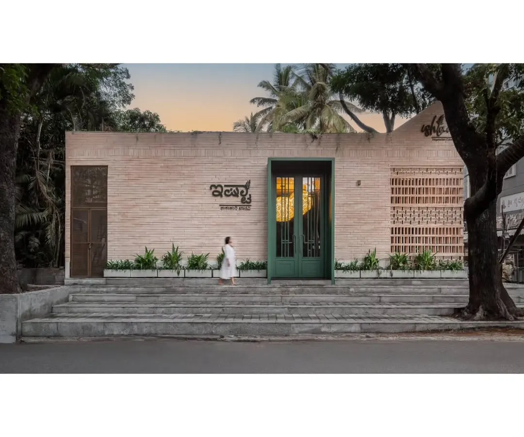 This is Ishtaa, our first F&B project, an Andhra cuisine restaurant in Jayanagar. The storefront design was crucial for us; we used an earthy brick facade and a striking green entryway to create an inviting presence that feels both modern and rooted in tradition.