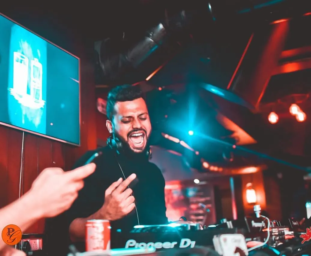 This is me in my element. That moment when the beat drops, the crowd roars, and everything just clicks. I live for creating these small moments of pure energy on the dance floor.