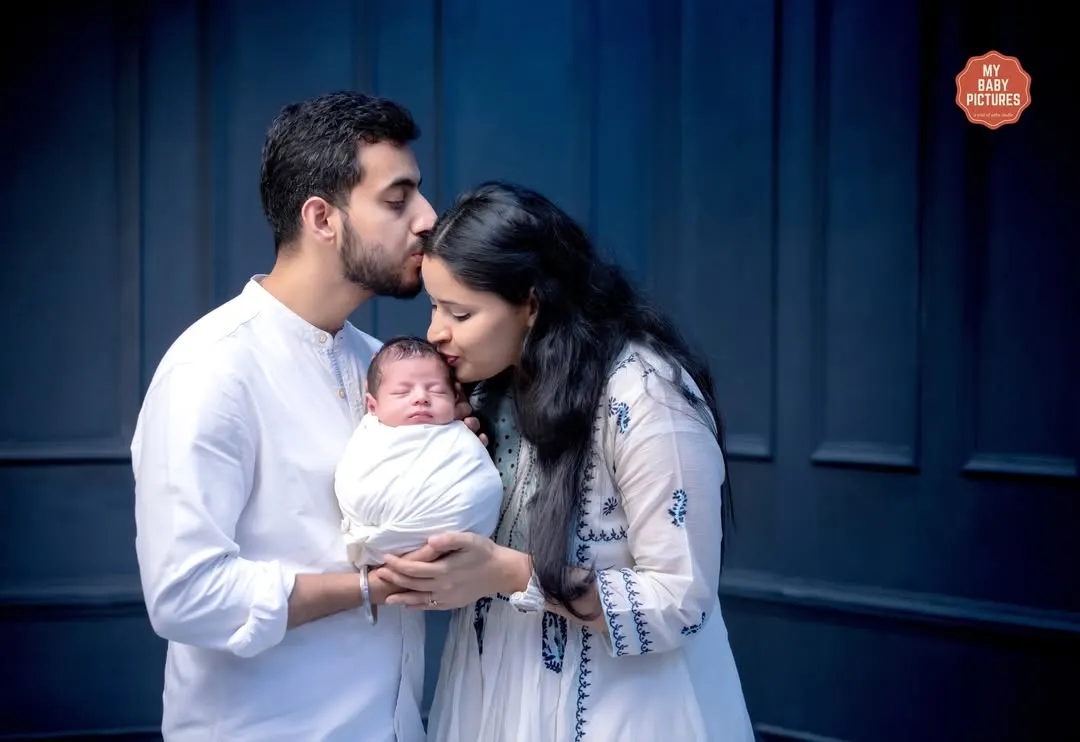 There is nothing more pure than the love for a new baby. I always encourage parents to get in the frame for these tender moments. This lifestyle newborn portrait captures that quiet, overwhelming love in the first few weeks.