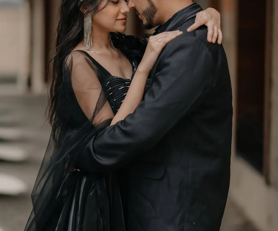 I love creating a moody, cinematic feel for pre-wedding shoots. Here in Mumbai, we used the classic architecture to frame this intimate moment, letting the couple's connection be the main story. The focus is on emotion, not just a pose.