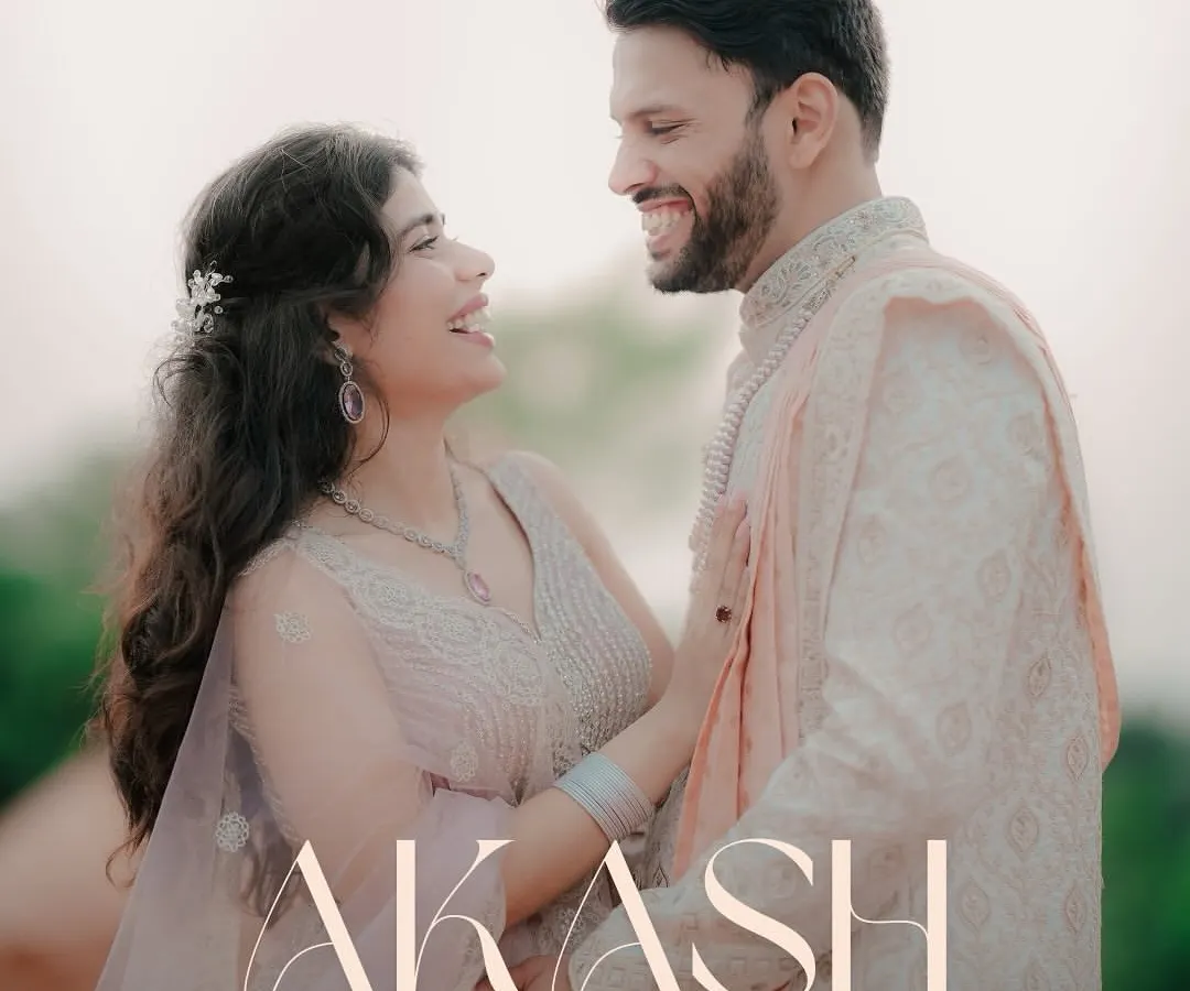 A perfect candid moment between Aakash and Mohini. My goal is to make you feel so comfortable that you forget the camera is there, capturing the genuine smiles and connection that define your relationship.