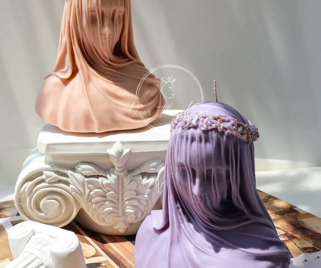 Inspired by Renaissance art, my Veiled Lady candle from the Olympia collection brings a touch of timeless drama and sophistication to your space. The delicate folds of the veil are captured in vegan soy wax, making it a true sculptural centerpiece.