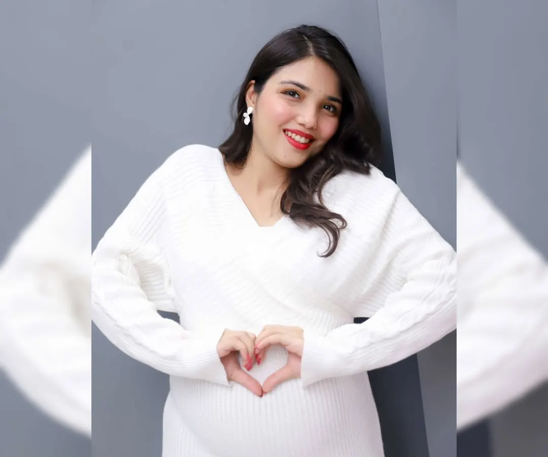 A simple, timeless portrait from one of our studio sessions. We love this classic pose, a heart for the little heart beating inside. It’s all about celebrating your beautiful bump in a clean, simple setting.