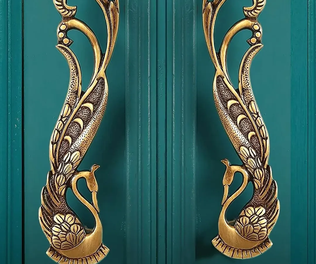 Let the details do the talking. We designed these peacock main door handles, intricately crafted from solid brass, to turn any entrance into a piece of art. This is where Indian heritage meets timeless elegance.