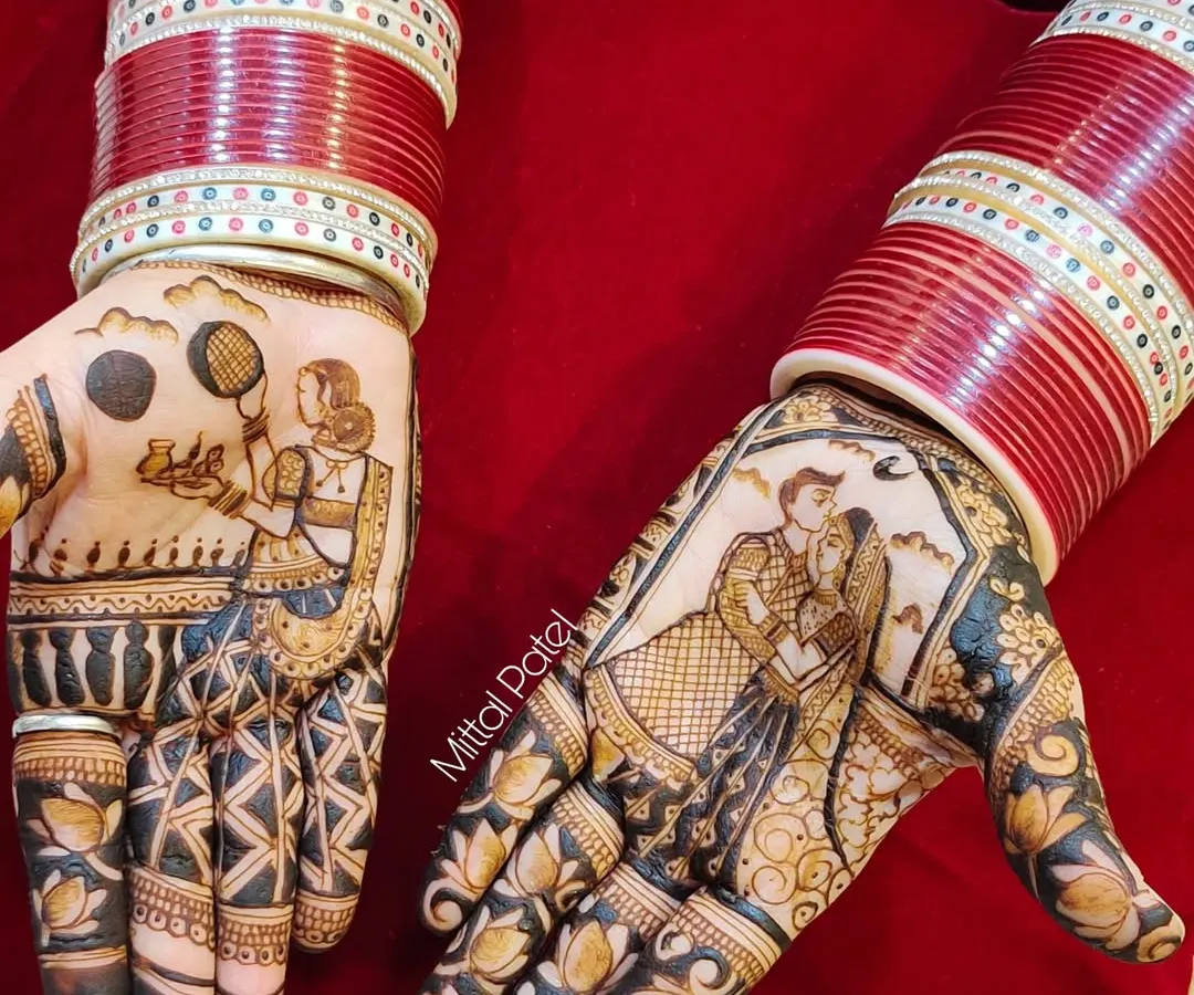 This is a classic Karwa Chauth design, rich with tradition. One palm shows a woman in traditional attire with a chalni and diya looking at the moon, while the other features a romantic portrait of a couple. The red bridal bangles complete the festive look.
