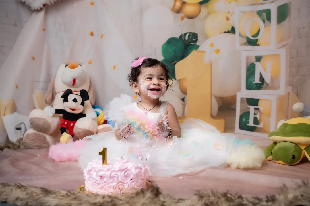 Nothing says "Happy First Birthday" like a joyful cake smash! We create a fun and safe environment in our studio for your little one to make a happy mess, resulting in unforgettable photos filled with laughter.