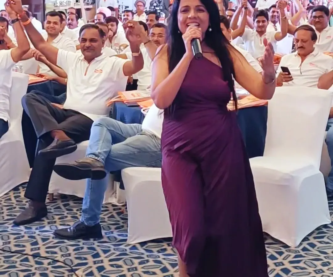 This is where the magic happens, right in the middle of the crowd. For me, hosting isn't about staying on stage; it's about connecting with everyone in the room, making sure the energy is high and every single person feels like part of the event. This was a moment from the Orange Cookware dealers meet.