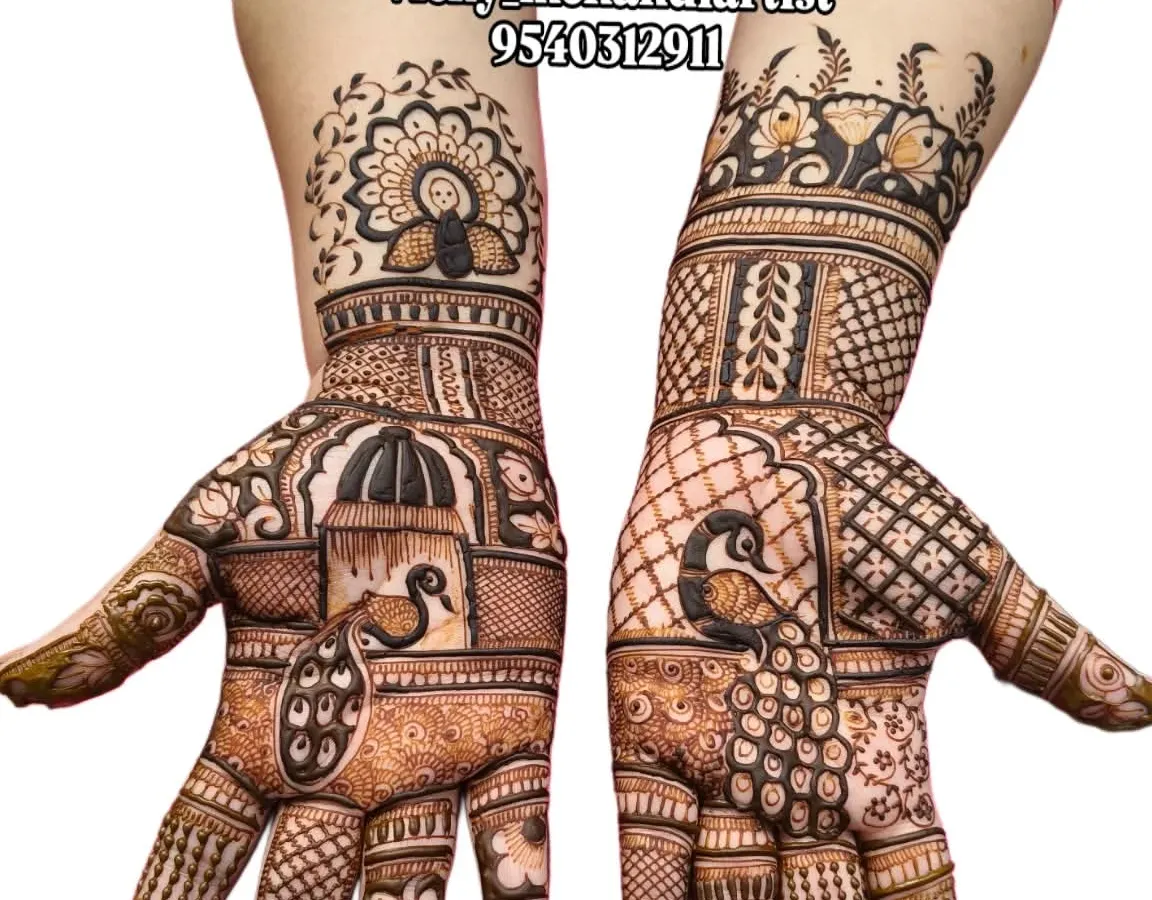 I love creating these fully detailed traditional mehandi designs. This piece features classic peacock and architectural motifs, perfect for a wedding guest who wants an elaborate look.