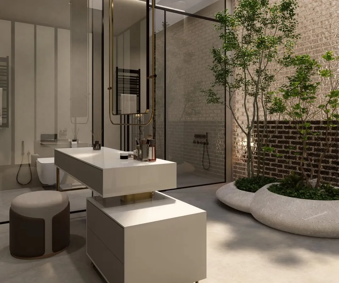 We believe bathrooms should be personal sanctuaries. This design incorporates an indoor courtyard with a live tree, separated by a glass wall, bringing a sense of calm and nature into the room. The floating vanity and minimalist fixtures create a spa-like experience, showcasing our approach to luxury bathroom design.