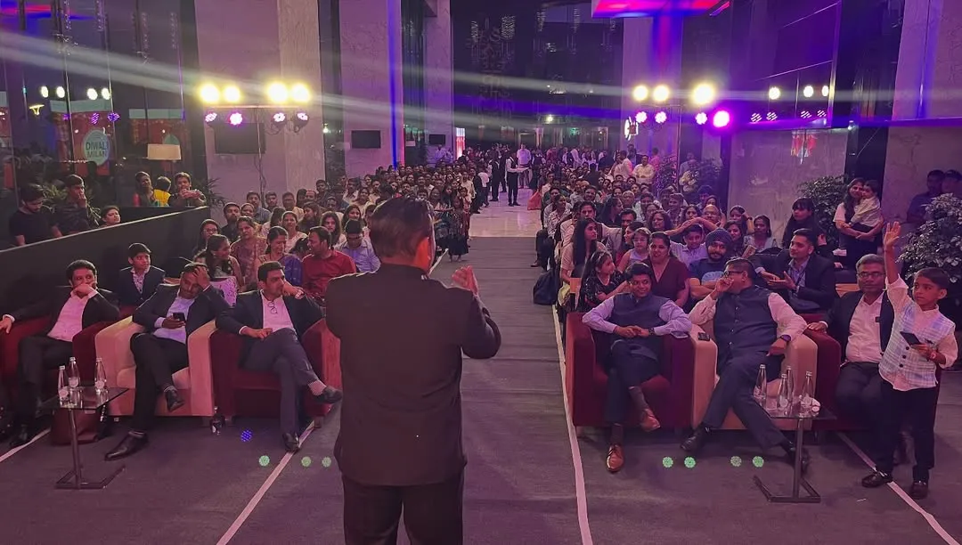 Performing for a huge audience at a corporate Diwali event is always an amazing experience. This shot shows me engaging with a crowd of hundreds, proving that my magic can fill even the biggest stages and bring everyone together for a shared moment of wonder.