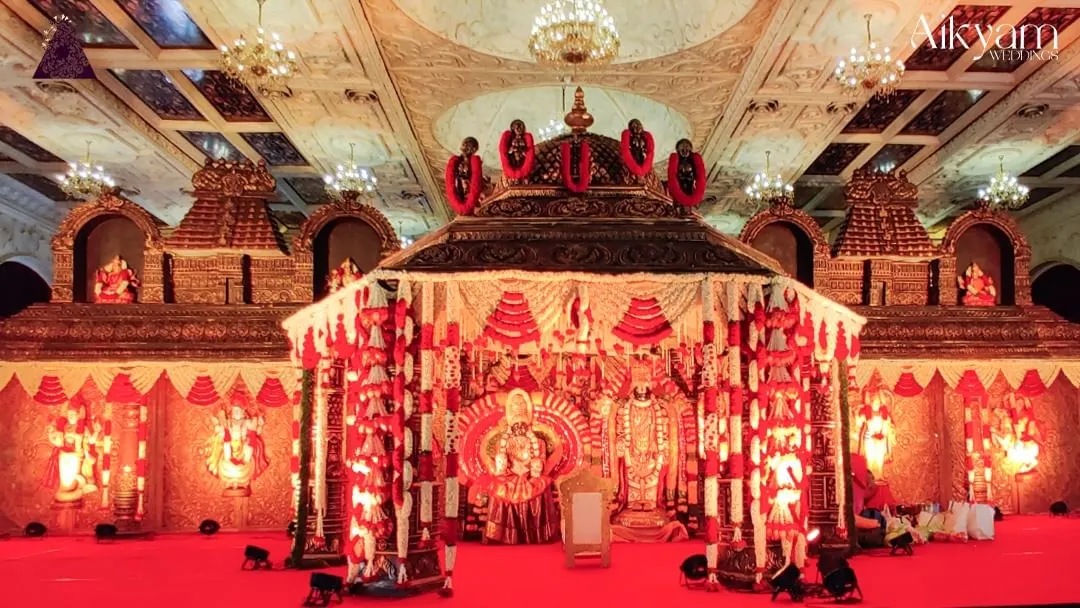 We specialize in creating breathtaking, temple-style mandaps that honor tradition. This expansive setup features intricate carvings and layers of floral garlands, creating a divine atmosphere for the sacred wedding rituals.